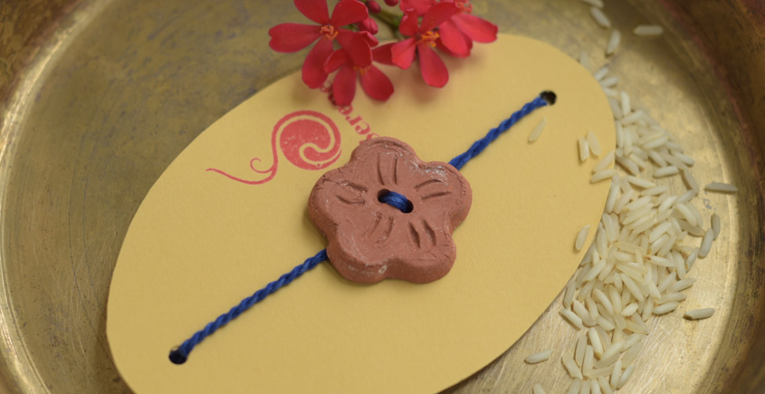 Terracotta ❂ Handmade . Rakhi { e }